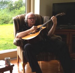 Douglas Lee Saum Playing Guitar